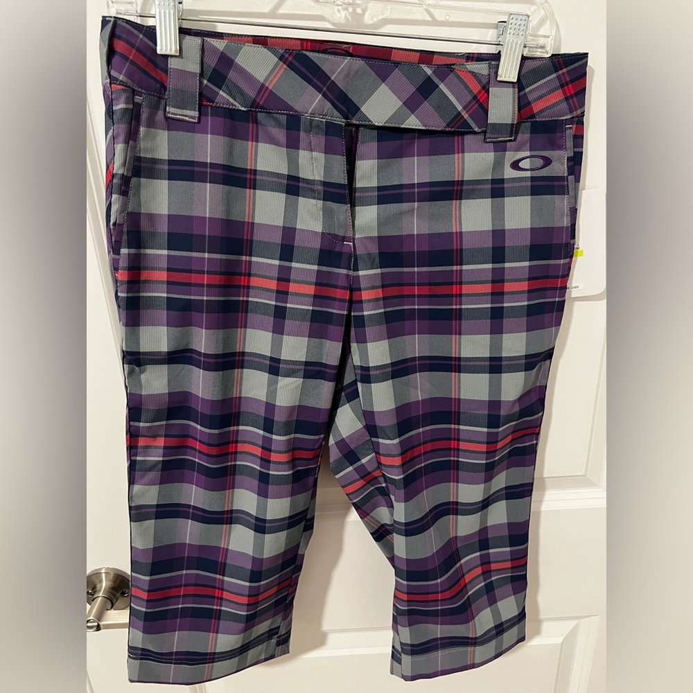 Oakley Bermuda / golf shorts. Size 4. Plaid purple colors and pink.